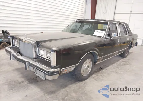 1984 Lincoln Town Car из США, поврежденный, VIN 1LNBP96F1EY710923
